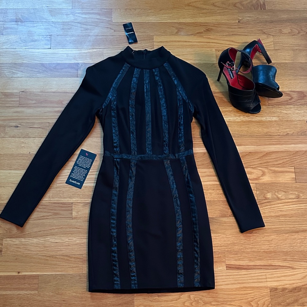 Bebe mini dress/ size XS new w/ tags